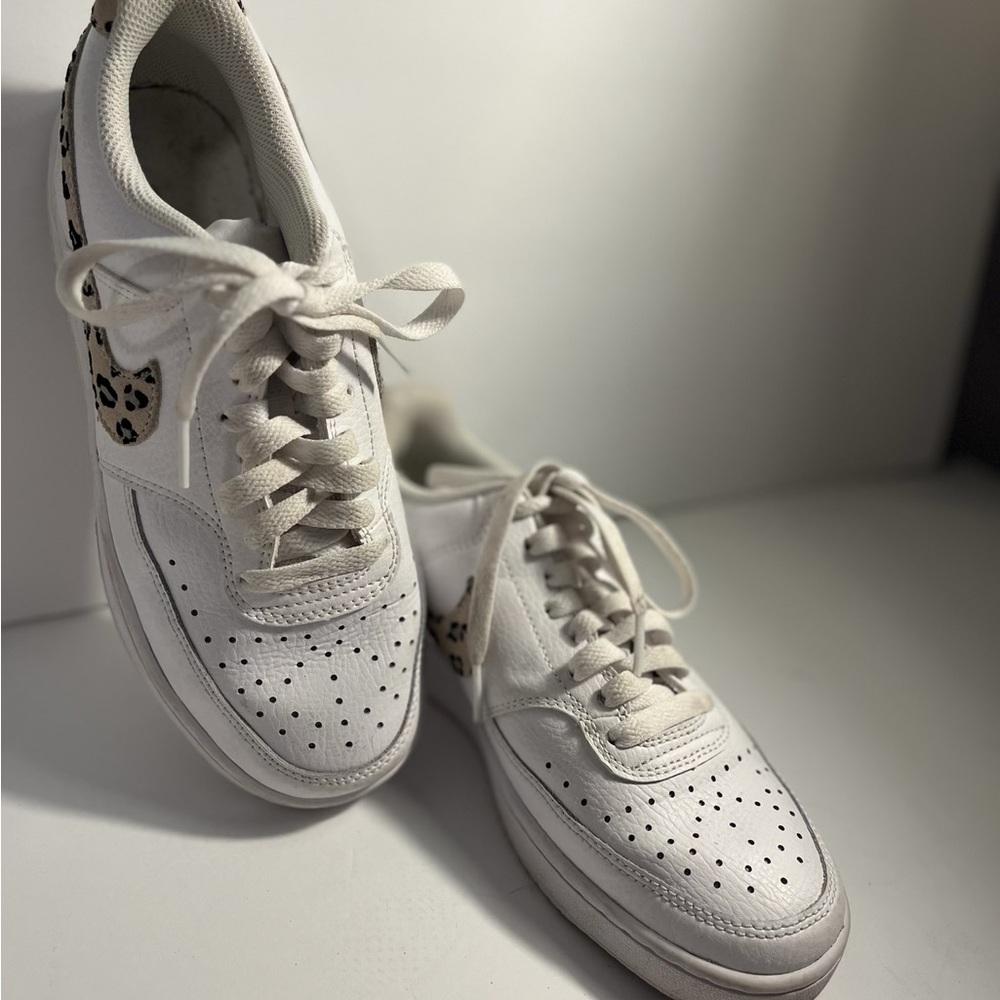 Nike White Sneakers Classic Design with leopard print details.